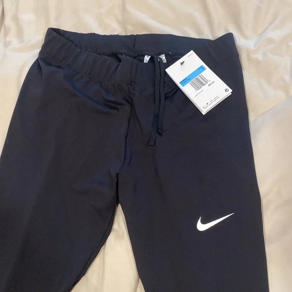 NWT Nike running leggings with ankle zipper and drawstring